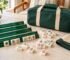 travel Mahjong set with bag and racks, compact American Mahjong tiles, green racks, folded mat