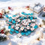 A 160-tile Christmas American Mahjong set with turquoise backs and colorful layered edges